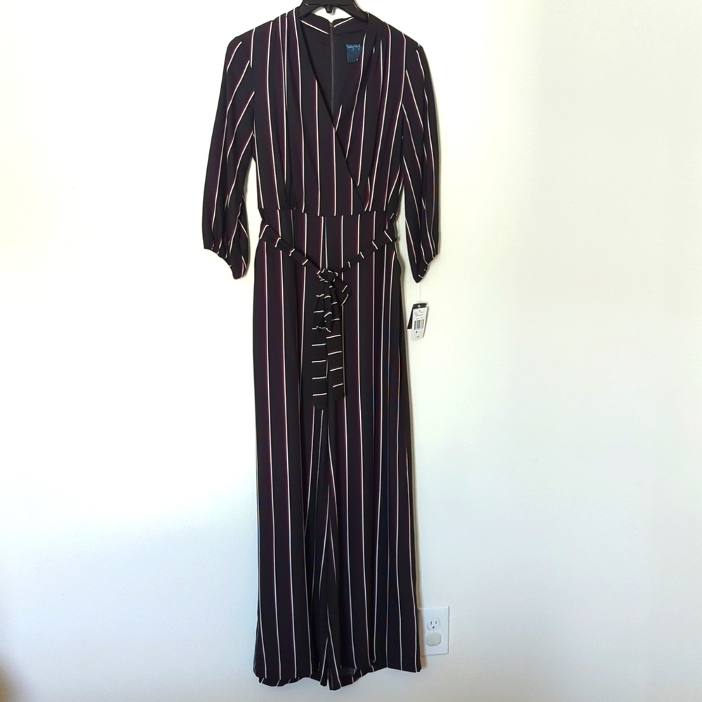 Gabby Skye Women's black with striped jumpsuit. Size 10.